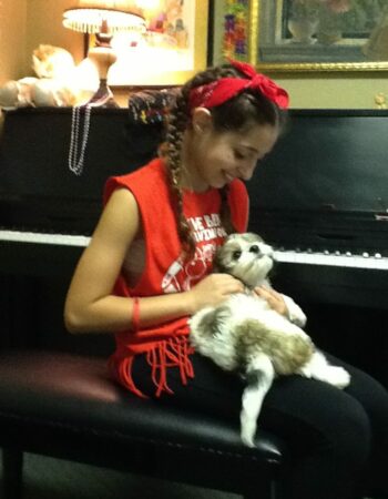 cavachon puppy with girl